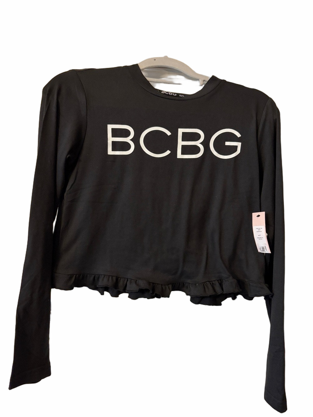 BCBGeneration Y2K NWT long sleeve logo ruffled crop top. S/P